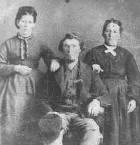 john fisher with his wife and sister.
