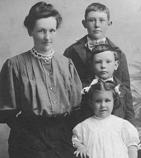 O'Rouark family, Nellie, Gerold, Douglas, and Allegra. James is not there.  Nellie appears to be pregnant at the time.