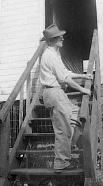 george vautier on steps at 2317 grand 1952