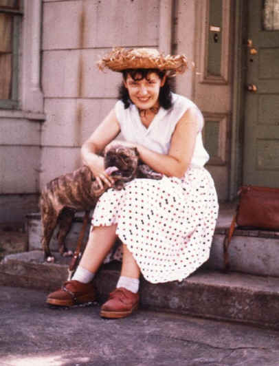 Marie Vautier taken about 1957 with her pet bulldog.