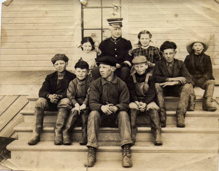 School picture Bellingham (New Whatcom). Eddie Vautier is on the far left; next to him is Percy Vautier, then George Vautier. Joseph Vautier is 2nd from the right and Rita is between Joe and the Sergeant.