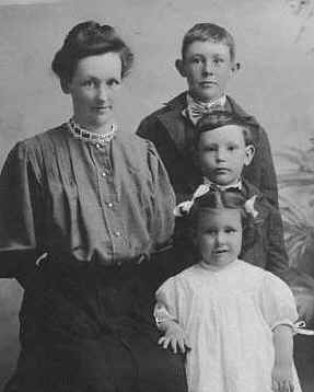Nellie with her kids.  this was while she was pregnant with her youngest Daughter