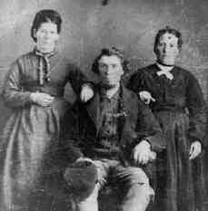 From a tintype. John Fisher with his wife, Margret Wynn Fisher to the left and his sister, Phoebe Fisher Richardson to the right. Phoebe lived to the age of 99.